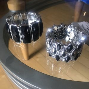 2 fashion black and silver bracelets.